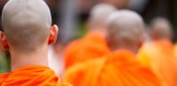 Symbolbild: Buddhisten (c)shutterstock, bearbeitet by iQ