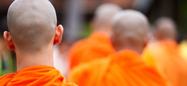 Symbolbild: Buddhisten (c)shutterstock, bearbeitet by iQ