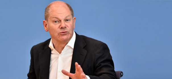 Symbolbild: Olaf Scholz © shutterstock, bearbeitet by iQ