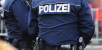 Symbolbild: Polizei © shutterstock, bearbeitet by IslamiQ.